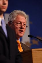 Former President Bill Clinton hands out commitment certificates to CGIU attendees for their exceptional pledges to the CGI cause during the opening plenary session of the CGIU meeting.  Day one of the 2nd Annual Clinton Global Initiative University (CGIU) meeting was held at The University of Texas at Austin, Friday, February 13, 2009.

Filename: SRM_20090213_16462414.jpg
Aperture: f/2.8
Shutter Speed: 1/400
Body: Canon EOS 20D
Lens: Canon EF 300mm f/2.8 L IS