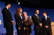 Former President Bill Clinton hands out commitment certificates to CGIU attendees for their exceptional pledges to the CGI cause during the opening plenary session of the CGIU meeting.  Day one of the 2nd Annual Clinton Global Initiative University (CGIU) meeting was held at The University of Texas at Austin, Friday, February 13, 2009.

Filename: SRM_20090213_16472526.jpg
Aperture: f/4.0
Shutter Speed: 1/125
Body: Canon EOS-1D Mark II
Lens: Canon EF 80-200mm f/2.8 L
