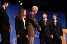 Former President Bill Clinton hands out commitment certificates to CGIU attendees for their exceptional pledges to the CGI cause during the opening plenary session of the CGIU meeting.  Day one of the 2nd Annual Clinton Global Initiative University (CGIU) meeting was held at The University of Texas at Austin, Friday, February 13, 2009.

Filename: SRM_20090213_16472932.jpg
Aperture: f/4.0
Shutter Speed: 1/125
Body: Canon EOS-1D Mark II
Lens: Canon EF 80-200mm f/2.8 L