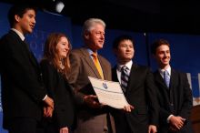 Former President Bill Clinton hands out commitment certificates to CGIU attendees for their exceptional pledges to the CGI cause during the opening plenary session of the CGIU meeting.  Day one of the 2nd Annual Clinton Global Initiative University (CGIU) meeting was held at The University of Texas at Austin, Friday, February 13, 2009.

Filename: SRM_20090213_16473640.jpg
Aperture: f/4.0
Shutter Speed: 1/200
Body: Canon EOS-1D Mark II
Lens: Canon EF 80-200mm f/2.8 L