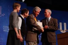 Former President Bill Clinton hands out commitment certificates to CGIU attendees for their exceptional pledges to the CGI cause during the opening plenary session of the CGIU meeting.  Day one of the 2nd Annual Clinton Global Initiative University (CGIU) meeting was held at The University of Texas at Austin, Friday, February 13, 2009.

Filename: SRM_20090213_16505484.jpg
Aperture: f/4.0
Shutter Speed: 1/200
Body: Canon EOS-1D Mark II
Lens: Canon EF 80-200mm f/2.8 L