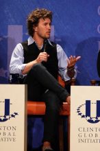 Blake Mycoskie, founder of TOMS shoes, was one of the guest speakers at the first plenary session of the CGIU meeting.  Day one of the 2nd Annual Clinton Global Initiative University (CGIU) meeting was held at The University of Texas at Austin, Friday, February 13, 2009.

Filename: SRM_20090213_17091870.jpg
Aperture: f/5.6
Shutter Speed: 1/250
Body: Canon EOS 20D
Lens: Canon EF 300mm f/2.8 L IS