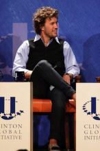 Blake Mycoskie, founder of TOMS shoes, donates one pair of shoes to a third world country for every pair of shoes they sell.  Day one of the 2nd Annual Clinton Global Initiative University (CGIU) meeting was held at The University of Texas at Austin, Friday, February 13, 2009.

Filename: SRM_20090213_17092663.jpg
Aperture: f/5.6
Shutter Speed: 1/250
Body: Canon EOS 20D
Lens: Canon EF 300mm f/2.8 L IS