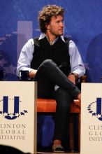 Blake Mycoskie, founder of TOMS shoes, donates one pair of shoes to a third world country for every pair of shoes they sell.  Day one of the 2nd Annual Clinton Global Initiative University (CGIU) meeting was held at The University of Texas at Austin, Friday, February 13, 2009.

Filename: SRM_20090213_17093666.jpg
Aperture: f/5.6
Shutter Speed: 1/250
Body: Canon EOS 20D
Lens: Canon EF 300mm f/2.8 L IS