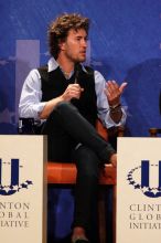 Blake Mycoskie, founder of TOMS shoes, donates one pair of shoes to a third world country for every pair of shoes they sell.  Day one of the 2nd Annual Clinton Global Initiative University (CGIU) meeting was held at The University of Texas at Austin, Friday, February 13, 2009.

Filename: SRM_20090213_17103469.jpg
Aperture: f/5.6
Shutter Speed: 1/250
Body: Canon EOS 20D
Lens: Canon EF 300mm f/2.8 L IS