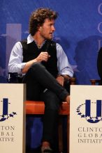 Blake Mycoskie, founder of TOMS shoes, donates one pair of shoes to a third world country for every pair of shoes they sell.  Day one of the 2nd Annual Clinton Global Initiative University (CGIU) meeting was held at The University of Texas at Austin, Friday, February 13, 2009.

Filename: SRM_20090213_17103974.jpg
Aperture: f/5.6
Shutter Speed: 1/250
Body: Canon EOS 20D
Lens: Canon EF 300mm f/2.8 L IS