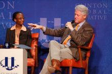 Mambidzeni Madzivire (L), BME graduate student at Mayo Graduate School, and Former President Bill Clinton (R) at the opening plenary session of the CGIU meeting.  Day one of the 2nd Annual Clinton Global Initiative University (CGIU) meeting was held at The University of Texas at Austin, Friday, February 13, 2009.

Filename: SRM_20090213_17144793.jpg
Aperture: f/5.6
Shutter Speed: 1/250
Body: Canon EOS-1D Mark II
Lens: Canon EF 300mm f/2.8 L IS