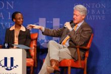 Mambidzeni Madzivire (L), BME graduate student at Mayo Graduate School, and Former President Bill Clinton (R) at the opening plenary session of the CGIU meeting.  Day one of the 2nd Annual Clinton Global Initiative University (CGIU) meeting was held at The University of Texas at Austin, Friday, February 13, 2009.

Filename: SRM_20090213_17144894.jpg
Aperture: f/5.6
Shutter Speed: 1/250
Body: Canon EOS-1D Mark II
Lens: Canon EF 300mm f/2.8 L IS