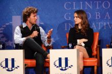 Blake Mycoskie (L), founder of TOMS shoes, and Natalie Portman (R) at the first plenary session of the CGIU meeting.  Day one of the 2nd Annual Clinton Global Initiative University (CGIU) meeting was held at The University of Texas at Austin, Friday, February 13, 2009.

Filename: SRM_20090213_17161705.jpg
Aperture: f/5.6
Shutter Speed: 1/200
Body: Canon EOS-1D Mark II
Lens: Canon EF 300mm f/2.8 L IS