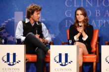Blake Mycoskie (L), founder of TOMS shoes, and Natalie Portman (R) at the first plenary session of the CGIU meeting.  Day one of the 2nd Annual Clinton Global Initiative University (CGIU) meeting was held at The University of Texas at Austin, Friday, February 13, 2009.

Filename: SRM_20090213_17163814.jpg
Aperture: f/5.6
Shutter Speed: 1/200
Body: Canon EOS-1D Mark II
Lens: Canon EF 300mm f/2.8 L IS