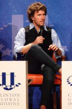 Blake Mycoskie, founder of TOMS shoes, donates one pair of shoes to a third world country for every pair of shoes they sell.  Day one of the 2nd Annual Clinton Global Initiative University (CGIU) meeting was held at The University of Texas at Austin, Friday, February 13, 2009.

Filename: SRM_20090213_17180730.jpg
Aperture: f/5.6
Shutter Speed: 1/200
Body: Canon EOS-1D Mark II
Lens: Canon EF 300mm f/2.8 L IS