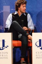 Blake Mycoskie, founder of TOMS shoes, donates one pair of shoes to a third world country for every pair of shoes they sell.  Day one of the 2nd Annual Clinton Global Initiative University (CGIU) meeting was held at The University of Texas at Austin, Friday, February 13, 2009.

Filename: SRM_20090213_17311390.jpg
Aperture: f/5.6
Shutter Speed: 1/200
Body: Canon EOS-1D Mark II
Lens: Canon EF 300mm f/2.8 L IS