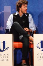 Blake Mycoskie, founder of TOMS shoes, donates one pair of shoes to a third world country for every pair of shoes they sell.  Day one of the 2nd Annual Clinton Global Initiative University (CGIU) meeting was held at The University of Texas at Austin, Friday, February 13, 2009.

Filename: SRM_20090213_17311391.jpg
Aperture: f/5.6
Shutter Speed: 1/200
Body: Canon EOS-1D Mark II
Lens: Canon EF 300mm f/2.8 L IS