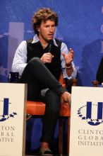 Blake Mycoskie, founder of TOMS shoes, donates one pair of shoes to a third world country for every pair of shoes they sell.  Day one of the 2nd Annual Clinton Global Initiative University (CGIU) meeting was held at The University of Texas at Austin, Friday, February 13, 2009.

Filename: SRM_20090213_17340692.jpg
Aperture: f/5.6
Shutter Speed: 1/200
Body: Canon EOS 20D
Lens: Canon EF 300mm f/2.8 L IS