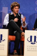 Blake Mycoskie, founder of TOMS shoes, donates one pair of shoes to a third world country for every pair of shoes they sell.  Day one of the 2nd Annual Clinton Global Initiative University (CGIU) meeting was held at The University of Texas at Austin, Friday, February 13, 2009.

Filename: SRM_20090213_17340793.jpg
Aperture: f/5.6
Shutter Speed: 1/200
Body: Canon EOS 20D
Lens: Canon EF 300mm f/2.8 L IS