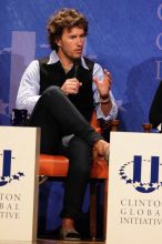 Blake Mycoskie, founder of TOMS shoes, donates one pair of shoes to a third world country for every pair of shoes they sell.  Day one of the 2nd Annual Clinton Global Initiative University (CGIU) meeting was held at The University of Texas at Austin, Friday, February 13, 2009.

Filename: SRM_20090213_17340895.jpg
Aperture: f/5.6
Shutter Speed: 1/200
Body: Canon EOS 20D
Lens: Canon EF 300mm f/2.8 L IS