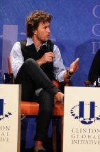 Blake Mycoskie, founder of TOMS shoes, donates one pair of shoes to a third world country for every pair of shoes they sell.  Day one of the 2nd Annual Clinton Global Initiative University (CGIU) meeting was held at The University of Texas at Austin, Friday, February 13, 2009.

Filename: SRM_20090213_17341400.jpg
Aperture: f/5.6
Shutter Speed: 1/200
Body: Canon EOS 20D
Lens: Canon EF 300mm f/2.8 L IS
