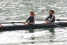 The Texas Rowing second novice eight team, with coxswain Emma Dirks, Sharon Dietz, Lucia Babar, Kait Postle, Ashley Hiatt, Andrea Janowski, Madonna Bregon, Daryn Ofczarzak and Dani Mohling, finished with a time of 7:34.5, defeating Iowa which completed the race in 7:35.6. This was the second session of the Longhorn Invitational, Saturday morning, March 21, 2009 on Lady Bird Lake.  They won a total of three races over the weekend.

Filename: SRM_20090321_08511026.jpg
Aperture: f/4.0
Shutter Speed: 1/1600
Body: Canon EOS-1D Mark II
Lens: Canon EF 300mm f/2.8 L IS