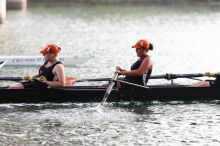 The Texas Rowing second novice eight team, with coxswain Emma Dirks, Sharon Dietz, Lucia Babar, Kait Postle, Ashley Hiatt, Andrea Janowski, Madonna Bregon, Daryn Ofczarzak and Dani Mohling, finished with a time of 7:34.5, defeating Iowa which completed the race in 7:35.6. This was the second session of the Longhorn Invitational, Saturday morning, March 21, 2009 on Lady Bird Lake.  They won a total of three races over the weekend.

Filename: SRM_20090321_09351759.jpg
Aperture: f/4.0
Shutter Speed: 1/1250
Body: Canon EOS-1D Mark II
Lens: Canon EF 300mm f/2.8 L IS