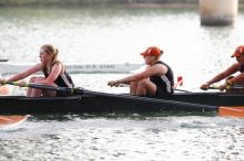 The Texas Rowing second novice eight team, with coxswain Emma Dirks, Sharon Dietz, Lucia Babar, Kait Postle, Ashley Hiatt, Andrea Janowski, Madonna Bregon, Daryn Ofczarzak and Dani Mohling, finished with a time of 7:34.5, defeating Iowa which completed the race in 7:35.6. This was the second session of the Longhorn Invitational, Saturday morning, March 21, 2009 on Lady Bird Lake.  They won a total of three races over the weekend.

Filename: SRM_20090321_09351863.jpg
Aperture: f/4.0
Shutter Speed: 1/1250
Body: Canon EOS-1D Mark II
Lens: Canon EF 300mm f/2.8 L IS
