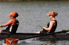 The Texas Rowing second novice eight team, with coxswain Emma Dirks, Sharon Dietz, Lucia Babar, Kait Postle, Ashley Hiatt, Andrea Janowski, Madonna Bregon, Daryn Ofczarzak and Dani Mohling, finished with a time of 8:07.5, losing to Wisconsin, which completed the race in 7:47.1. This was the third session of the Longhorn Invitational, Saturday afternoon, March 21, 2009 on Lady Bird Lake.  They won a total of three races over the weekend.

Filename: SRM_20090321_16013810.jpg
Aperture: f/5.6
Shutter Speed: 1/2500
Body: Canon EOS-1D Mark II
Lens: Canon EF 300mm f/2.8 L IS