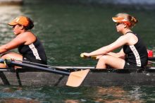 The Texas Rowing second novice eight team, with coxswain Emma Dirks, Sharon Dietz, Lucia Babar, Kait Postle, Ashley Hiatt, Andrea Janowski, Madonna Bregon, Daryn Ofczarzak and Dani Mohling, finished with a time of 8:07.5, losing to Wisconsin, which completed the race in 7:47.1. This was the third session of the Longhorn Invitational, Saturday afternoon, March 21, 2009 on Lady Bird Lake.  They won a total of three races over the weekend.

Filename: SRM_20090321_16014114.jpg
Aperture: f/5.6
Shutter Speed: 1/1600
Body: Canon EOS-1D Mark II
Lens: Canon EF 300mm f/2.8 L IS