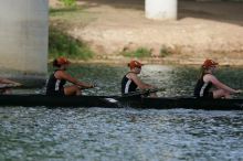 The Texas Rowing second novice eight team, with coxswain Emma Dirks, Sharon Dietz, Lucia Babar, Kait Postle, Ashley Hiatt, Andrea Janowski, Madonna Bregon, Daryn Ofczarzak and Dani Mohling, finished with a time of 8:07.5, losing to Wisconsin, which completed the race in 7:47.1. This was the third session of the Longhorn Invitational, Saturday afternoon, March 21, 2009 on Lady Bird Lake.  They won a total of three races over the weekend.

Filename: SRM_20090321_16063620.jpg
Aperture: f/5.6
Shutter Speed: 1/1000
Body: Canon EOS-1D Mark II
Lens: Canon EF 300mm f/2.8 L IS