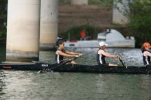 The Texas Rowing first novice eight team finished with a time of 7:51.3, losing to Wisconsin, which completed the race in 7:39.4. This was the third session of the Longhorn Invitational, Saturday afternoon, March 21, 2009 on Lady Bird Lake.

Filename: SRM_20090321_16164458.jpg
Aperture: f/4.0
Shutter Speed: 1/1250
Body: Canon EOS-1D Mark II
Lens: Canon EF 300mm f/2.8 L IS