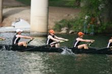 The Texas Rowing first novice eight team finished with a time of 7:51.3, losing to Wisconsin, which completed the race in 7:39.4. This was the third session of the Longhorn Invitational, Saturday afternoon, March 21, 2009 on Lady Bird Lake.

Filename: SRM_20090321_16164660.jpg
Aperture: f/4.0
Shutter Speed: 1/1600
Body: Canon EOS-1D Mark II
Lens: Canon EF 300mm f/2.8 L IS