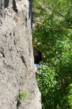 Javier Morales leading up Nose Print on the Windshield (5.11c), shot from the top of Ack! (5.11b, but using the crack for the start instead) that I top roped up with my camera on my back.  It was another long day of rock climbing at Seismic Wall on Austin's Barton Creek Greenbelt, Sunday, April 5, 2009.

Filename: SRM_20090405_13055496.jpg
Aperture: f/6.3
Shutter Speed: 1/400
Body: Canon EOS-1D Mark II
Lens: Canon EF 80-200mm f/2.8 L