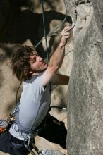 Andrew Dreher attempting the dyno while leading Lick the Window (5.10c), shot from the top of Ack! (5.11b, but using the crack for the start instead) that I top roped up with my camera on my back.  It was another long day of rock climbing at Seismic Wall on Austin's Barton Creek Greenbelt, Sunday, April 5, 2009.

Filename: SRM_20090405_13155911.jpg
Aperture: f/10.0
Shutter Speed: 1/500
Body: Canon EOS-1D Mark II
Lens: Canon EF 80-200mm f/2.8 L