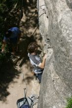 Andrew Dreher attempting the dyno while leading Lick the Window (5.10c) with Javier Morales belaying, shot from the top of Ack! (5.11b, but using the crack for the start instead) that I top roped up with my camera on my back.  It was another long day of rock climbing at Seismic Wall on Austin's Barton Creek Greenbelt, Sunday, April 5, 2009.

Filename: SRM_20090405_13171533.jpg
Aperture: f/9.0
Shutter Speed: 1/500
Body: Canon EOS-1D Mark II
Lens: Canon EF 80-200mm f/2.8 L