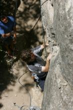 Andrew Dreher attempting the dyno while leading Lick the Window (5.10c) with Javier Morales belaying, shot from the top of Ack! (5.11b, but using the crack for the start instead) that I top roped up with my camera on my back.  It was another long day of rock climbing at Seismic Wall on Austin's Barton Creek Greenbelt, Sunday, April 5, 2009.

Filename: SRM_20090405_13171835.jpg
Aperture: f/9.0
Shutter Speed: 1/500
Body: Canon EOS-1D Mark II
Lens: Canon EF 80-200mm f/2.8 L