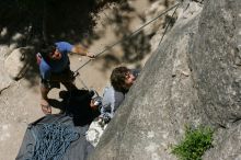 Andrew Dreher attempting the dyno while leading Lick the Window (5.10c) with Javier Morales belaying, shot from the top of Ack! (5.11b, but using the crack for the start instead) that I top roped up with my camera on my back.  It was another long day of rock climbing at Seismic Wall on Austin's Barton Creek Greenbelt, Sunday, April 5, 2009.

Filename: SRM_20090405_13212036.jpg
Aperture: f/11.0
Shutter Speed: 1/500
Body: Canon EOS-1D Mark II
Lens: Canon EF 80-200mm f/2.8 L