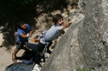 Andrew Dreher attempting the dyno while leading Lick the Window (5.10c) with Javier Morales belaying, shot from the top of Ack! (5.11b, but using the crack for the start instead) that I top roped up with my camera on my back.  It was another long day of rock climbing at Seismic Wall on Austin's Barton Creek Greenbelt, Sunday, April 5, 2009.

Filename: SRM_20090405_13212141.jpg
Aperture: f/11.0
Shutter Speed: 1/500
Body: Canon EOS-1D Mark II
Lens: Canon EF 80-200mm f/2.8 L