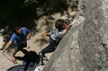 Andrew Dreher attempting the dyno while leading Lick the Window (5.10c) with Javier Morales belaying, shot from the top of Ack! (5.11b, but using the crack for the start instead) that I top roped up with my camera on my back.  It was another long day of rock climbing at Seismic Wall on Austin's Barton Creek Greenbelt, Sunday, April 5, 2009.

Filename: SRM_20090405_13212247.jpg
Aperture: f/11.0
Shutter Speed: 1/500
Body: Canon EOS-1D Mark II
Lens: Canon EF 80-200mm f/2.8 L