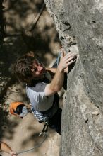 Andrew Dreher leading Lick the Window (5.10c), shot from the top of Ack! (5.11b, but using the crack for the start instead) that I top roped up with my camera on my back.  It was another long day of rock climbing at Seismic Wall on Austin's Barton Creek Greenbelt, Sunday, April 5, 2009.

Filename: SRM_20090405_13213652.jpg
Aperture: f/11.0
Shutter Speed: 1/500
Body: Canon EOS-1D Mark II
Lens: Canon EF 80-200mm f/2.8 L