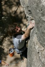 Andrew Dreher leading Lick the Window (5.10c), shot from the top of Ack! (5.11b, but using the crack for the start instead) that I top roped up with my camera on my back.  It was another long day of rock climbing at Seismic Wall on Austin's Barton Creek Greenbelt, Sunday, April 5, 2009.

Filename: SRM_20090405_13213653.jpg
Aperture: f/11.0
Shutter Speed: 1/500
Body: Canon EOS-1D Mark II
Lens: Canon EF 80-200mm f/2.8 L