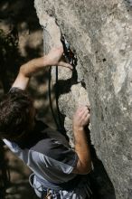 Andrew Dreher leading Lick the Window (5.10c), shot from the top of Ack! (5.11b, but using the crack for the start instead) that I top roped up with my camera on my back.  It was another long day of rock climbing at Seismic Wall on Austin's Barton Creek Greenbelt, Sunday, April 5, 2009.

Filename: SRM_20090405_13220167.jpg
Aperture: f/13.0
Shutter Speed: 1/500
Body: Canon EOS-1D Mark II
Lens: Canon EF 80-200mm f/2.8 L