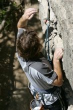 Andrew Dreher leading Lick the Window (5.10c), shot from the top of Ack! (5.11b, but using the crack for the start instead) that I top roped up with my camera on my back.  It was another long day of rock climbing at Seismic Wall on Austin's Barton Creek Greenbelt, Sunday, April 5, 2009.

Filename: SRM_20090405_13221071.jpg
Aperture: f/8.0
Shutter Speed: 1/500
Body: Canon EOS-1D Mark II
Lens: Canon EF 80-200mm f/2.8 L