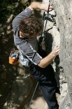 Andrew Dreher leading Lick the Window (5.10c), shot from the top of Ack! (5.11b, but using the crack for the start instead) that I top roped up with my camera on my back.  It was another long day of rock climbing at Seismic Wall on Austin's Barton Creek Greenbelt, Sunday, April 5, 2009.

Filename: SRM_20090405_13223478.jpg
Aperture: f/9.0
Shutter Speed: 1/500
Body: Canon EOS-1D Mark II
Lens: Canon EF 80-200mm f/2.8 L