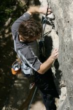 Andrew Dreher leading Lick the Window (5.10c), shot from the top of Ack! (5.11b, but using the crack for the start instead) that I top roped up with my camera on my back.  It was another long day of rock climbing at Seismic Wall on Austin's Barton Creek Greenbelt, Sunday, April 5, 2009.

Filename: SRM_20090405_13223479.jpg
Aperture: f/9.0
Shutter Speed: 1/500
Body: Canon EOS-1D Mark II
Lens: Canon EF 80-200mm f/2.8 L