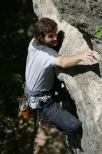 Andrew Dreher leading Lick the Window (5.10c), shot from the top of Ack! (5.11b, but using the crack for the start instead) that I top roped up with my camera on my back.  It was another long day of rock climbing at Seismic Wall on Austin's Barton Creek Greenbelt, Sunday, April 5, 2009.

Filename: SRM_20090405_13230307.jpg
Aperture: f/7.1
Shutter Speed: 1/500
Body: Canon EOS-1D Mark II
Lens: Canon EF 80-200mm f/2.8 L