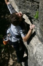 Andrew Dreher leading Lick the Window (5.10c), shot from the top of Ack! (5.11b, but using the crack for the start instead) that I top roped up with my camera on my back.  It was another long day of rock climbing at Seismic Wall on Austin's Barton Creek Greenbelt, Sunday, April 5, 2009.

Filename: SRM_20090405_13230714.jpg
Aperture: f/8.0
Shutter Speed: 1/500
Body: Canon EOS-1D Mark II
Lens: Canon EF 80-200mm f/2.8 L