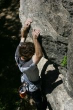 Andrew Dreher leading Lick the Window (5.10c), shot from the top of Ack! (5.11b, but using the crack for the start instead) that I top roped up with my camera on my back.  It was another long day of rock climbing at Seismic Wall on Austin's Barton Creek Greenbelt, Sunday, April 5, 2009.

Filename: SRM_20090405_13231216.jpg
Aperture: f/8.0
Shutter Speed: 1/500
Body: Canon EOS-1D Mark II
Lens: Canon EF 80-200mm f/2.8 L