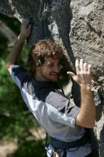 Andrew Dreher leading Lick the Window (5.10c), shot from the top of Ack! (5.11b, but using the crack for the start instead) that I top roped up with my camera on my back.  It was another long day of rock climbing at Seismic Wall on Austin's Barton Creek Greenbelt, Sunday, April 5, 2009.

Filename: SRM_20090405_13242750.jpg
Aperture: f/5.0
Shutter Speed: 1/500
Body: Canon EOS-1D Mark II
Lens: Canon EF 80-200mm f/2.8 L