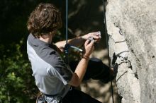 Andrew Dreher leading Lick the Window (5.10c), shot from the top of Ack! (5.11b, but using the crack for the start instead) that I top roped up with my camera on my back.  It was another long day of rock climbing at Seismic Wall on Austin's Barton Creek Greenbelt, Sunday, April 5, 2009.

Filename: SRM_20090405_13245452.jpg
Aperture: f/5.6
Shutter Speed: 1/500
Body: Canon EOS-1D Mark II
Lens: Canon EF 80-200mm f/2.8 L