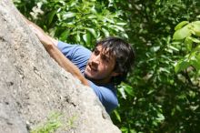 Javier Morales leading Nose Print on the Windshield (5.11c), shot from the top of Ack! (5.11b, but using the crack for the start instead) that I top roped up with my camera on my back.  It was another long day of rock climbing at Seismic Wall on Austin's Barton Creek Greenbelt, Sunday, April 5, 2009.

Filename: SRM_20090405_13321262.jpg
Aperture: f/8.0
Shutter Speed: 1/500
Body: Canon EOS-1D Mark II
Lens: Canon EF 80-200mm f/2.8 L