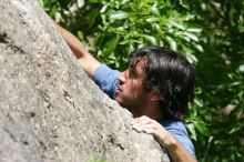 Javier Morales leading Nose Print on the Windshield (5.11c), shot from the top of Ack! (5.11b, but using the crack for the start instead) that I top roped up with my camera on my back.  It was another long day of rock climbing at Seismic Wall on Austin's Barton Creek Greenbelt, Sunday, April 5, 2009.

Filename: SRM_20090405_13321665.jpg
Aperture: f/8.0
Shutter Speed: 1/500
Body: Canon EOS-1D Mark II
Lens: Canon EF 80-200mm f/2.8 L