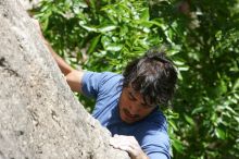 Javier Morales leading Nose Print on the Windshield (5.11c), shot from the top of Ack! (5.11b, but using the crack for the start instead) that I top roped up with my camera on my back.  It was another long day of rock climbing at Seismic Wall on Austin's Barton Creek Greenbelt, Sunday, April 5, 2009.

Filename: SRM_20090405_13335377.jpg
Aperture: f/8.0
Shutter Speed: 1/500
Body: Canon EOS-1D Mark II
Lens: Canon EF 80-200mm f/2.8 L